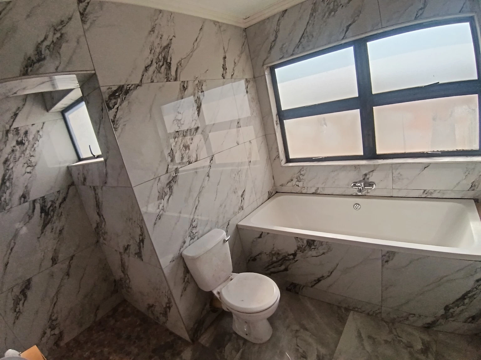 Aluminium residential bathroom window installation